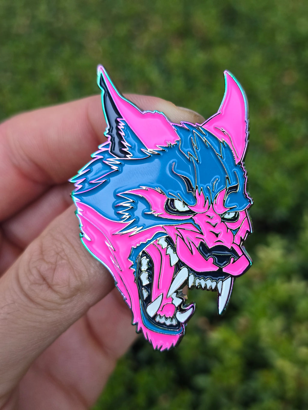 Werewolf Anodized Rainbow Metal Enamel Pin with Glow-in-the-Dark Teeth
